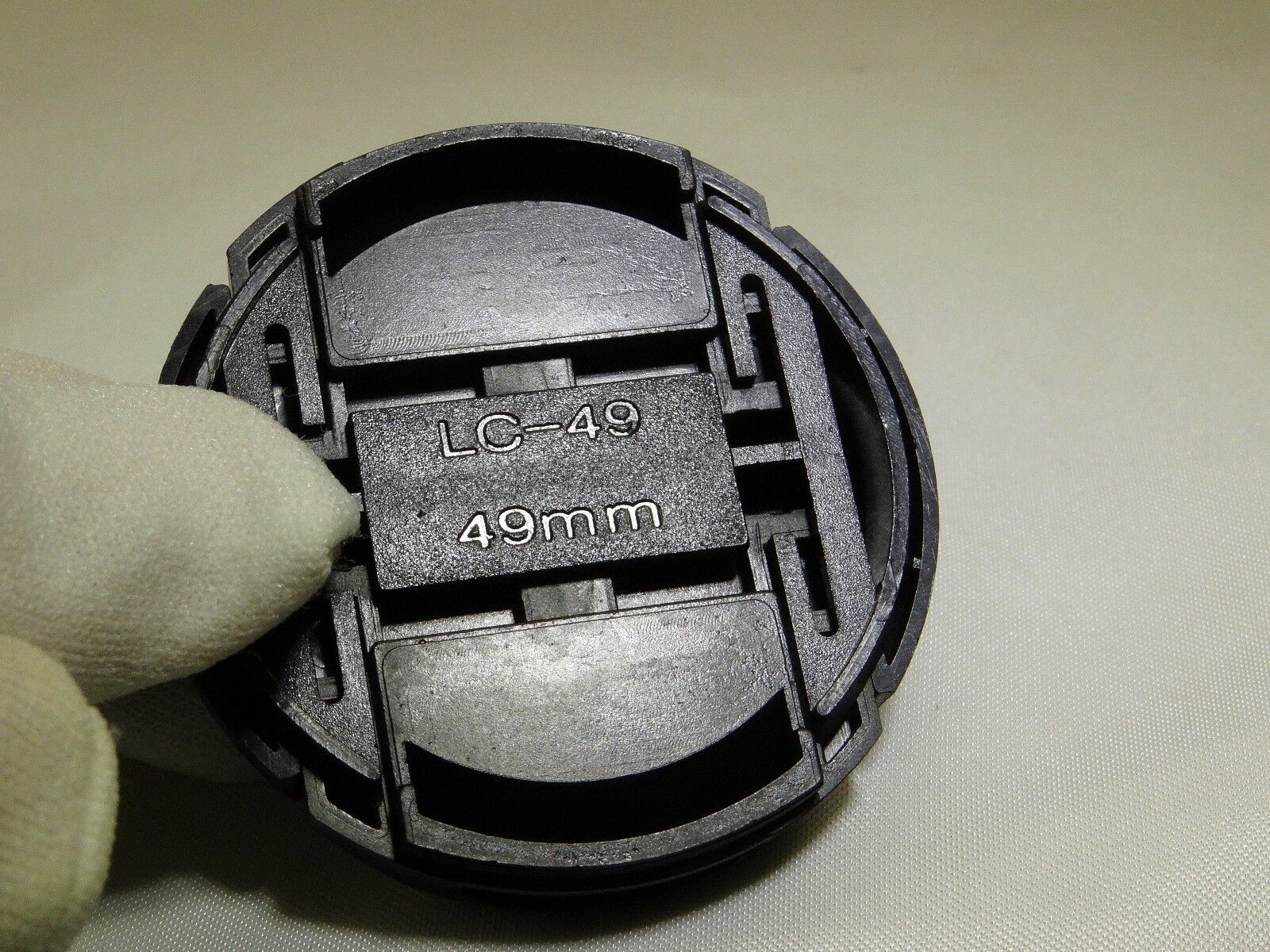 49mm Lens front cap snap on type plastic black