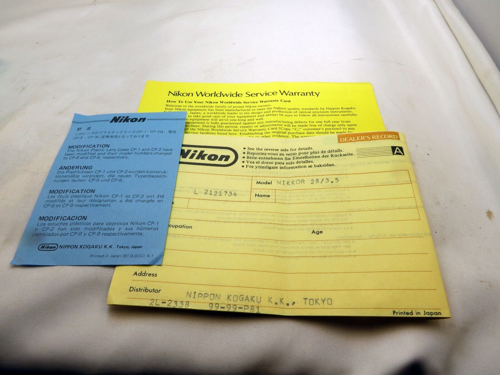 Nikon vintage 28mm f3.5 Ai-s Nikor lens warranty card