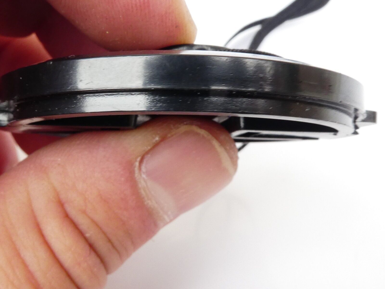 Used 49mm Lens Front Cap Black snap-on type plastic with strap Hong Kong