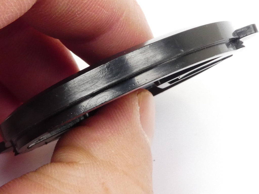 Used 49mm Lens Front Cap Black snap-on type made in Hong Kong plastic