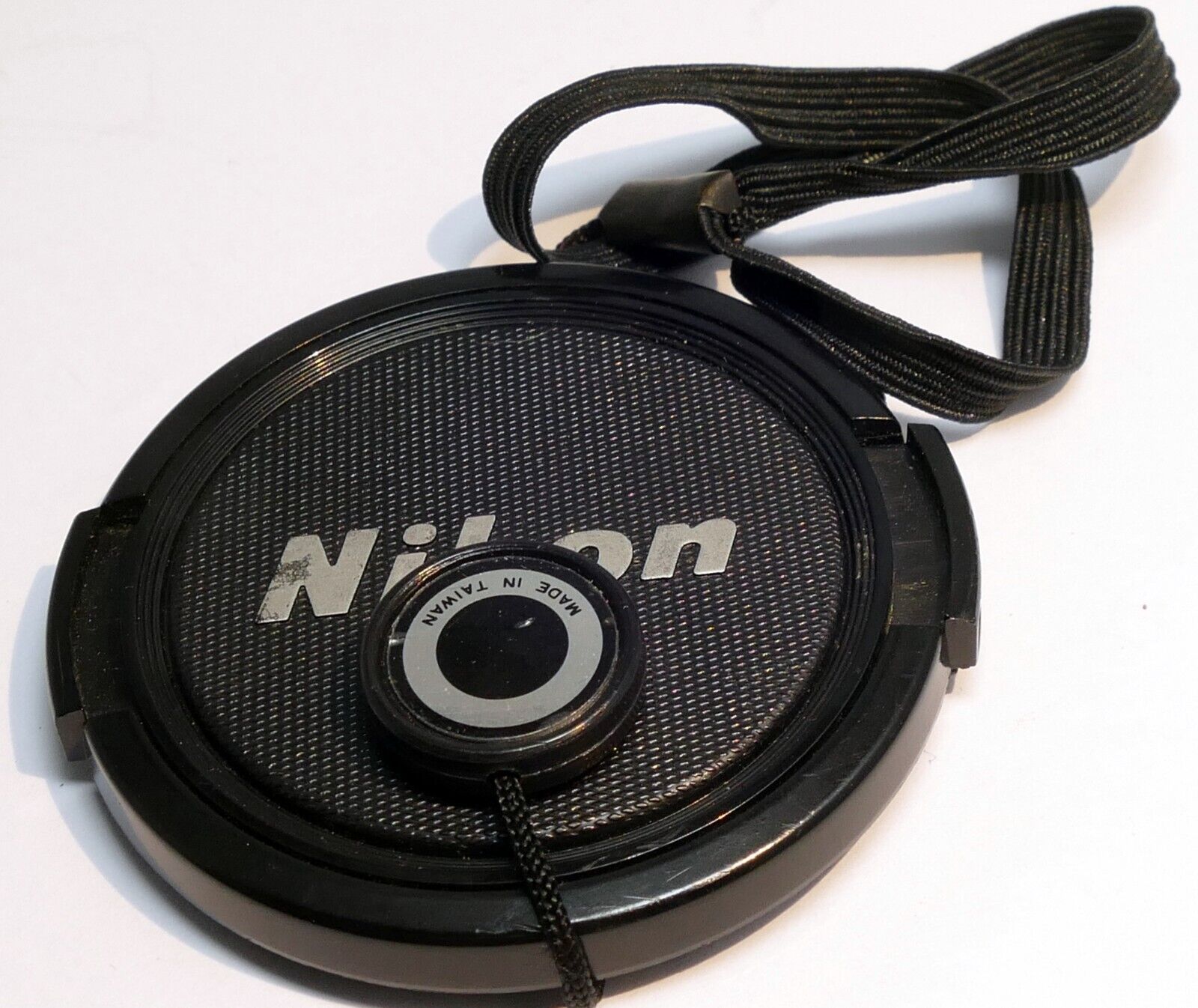 Nikon 52mm lens front cap  made in Japan used genuine OEM for 50mm f1.4 f1.8