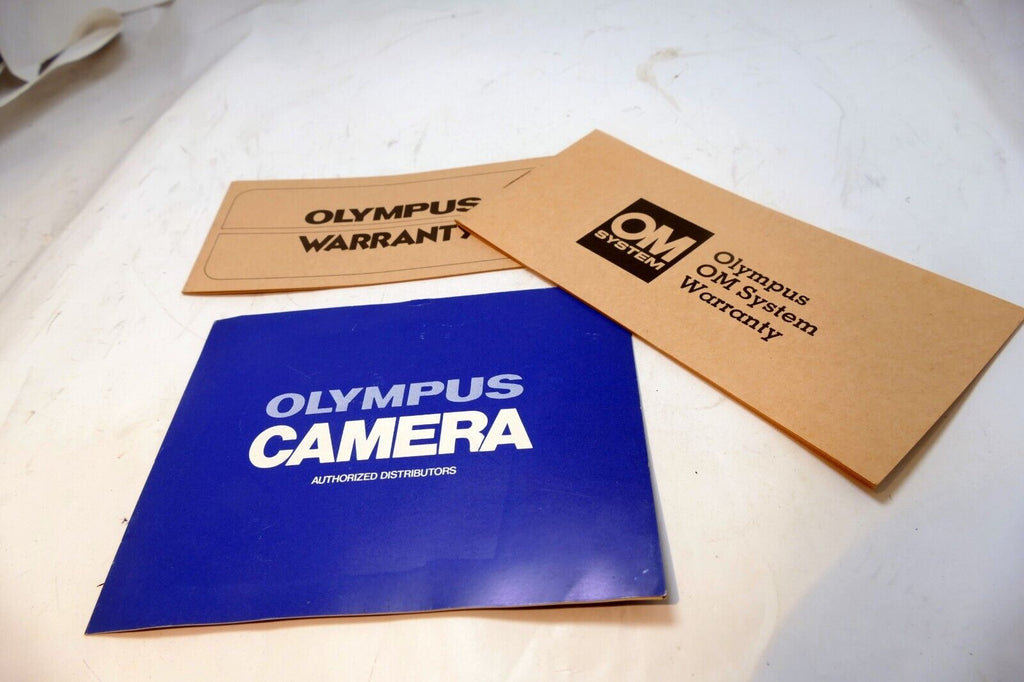 Olympus OM-2 camera warranty card vintage 1970's
