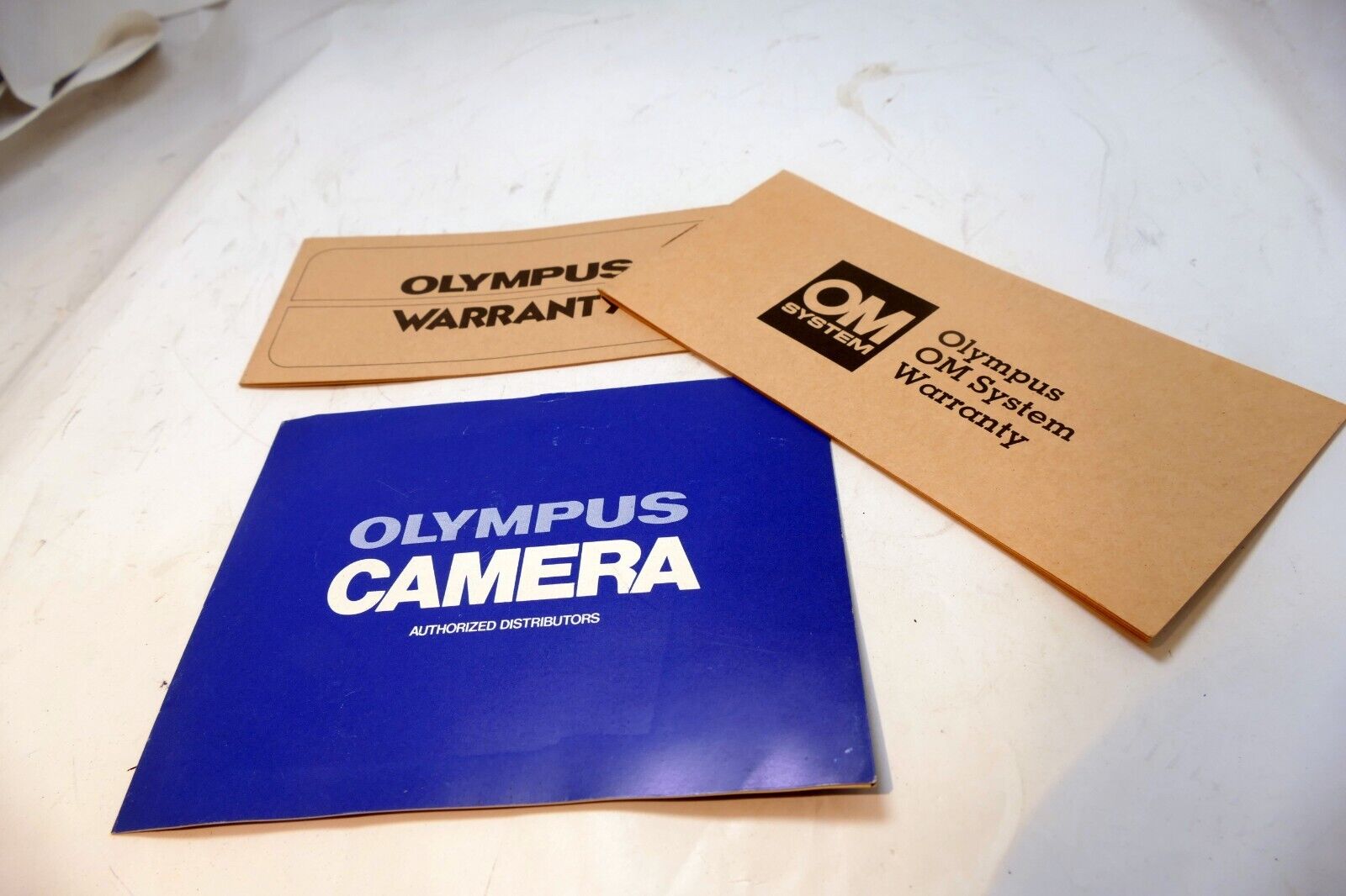 Olympus OM-2 camera warranty card vintage 1970's