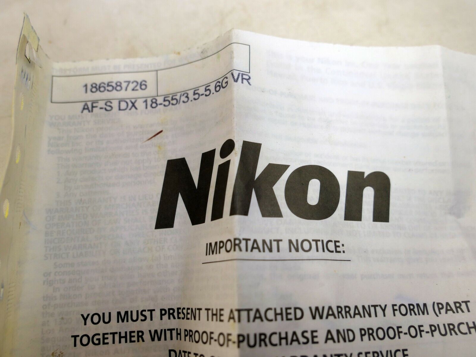 Nikon lens warranty card for 18-55mm f3.5-5.6 VR AF-S VR zoom  lens kit