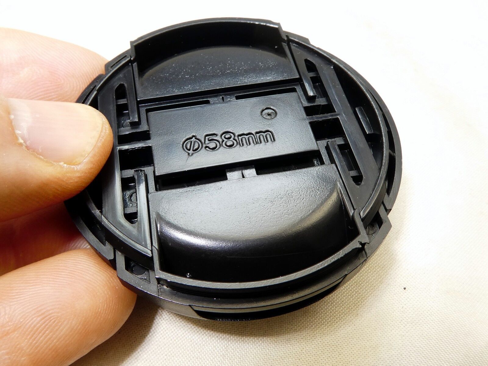 58mm Lens Front Cap  Black Center Pinch Plastic