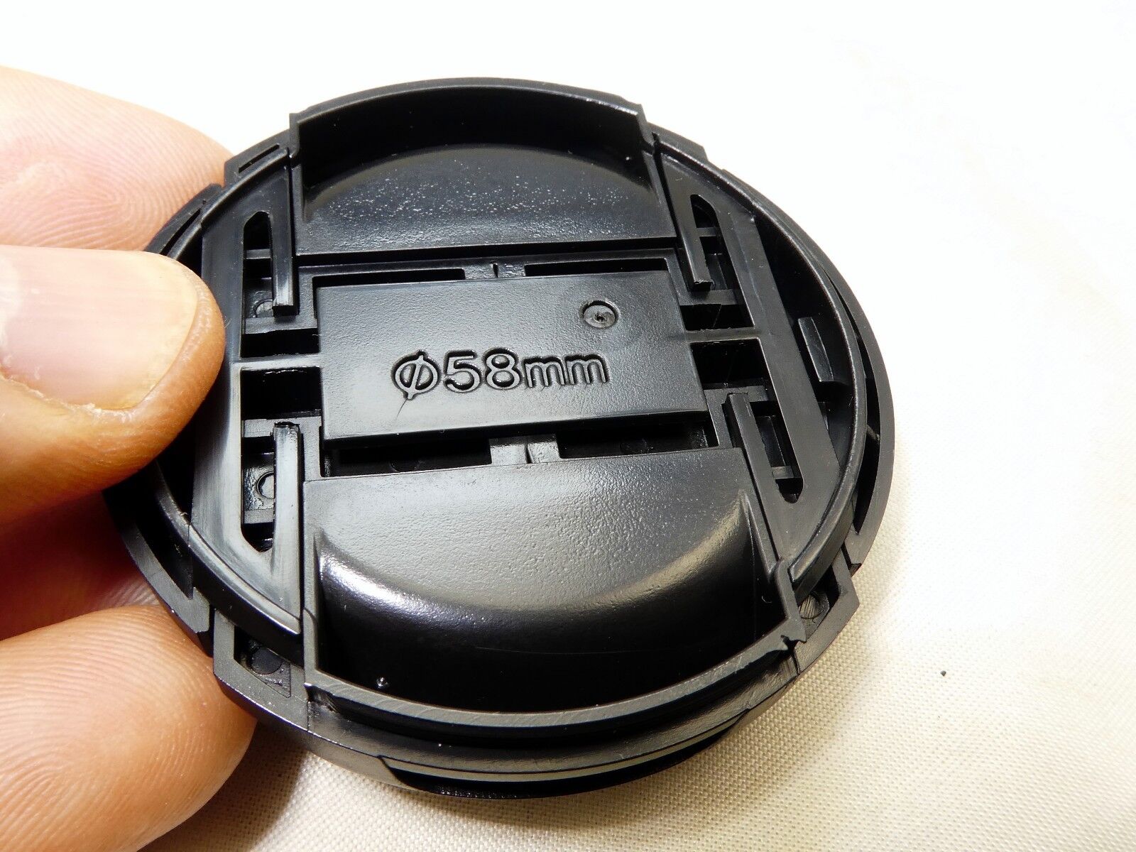 58mm Lens Front Cap  Black Center Pinch Plastic
