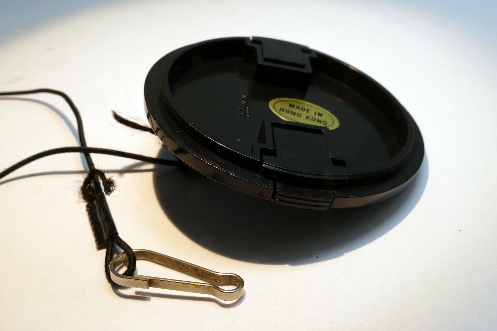 Plastic 55mm Lens front Cap made in Hong Kong with keeper string for f1.7 f1.8