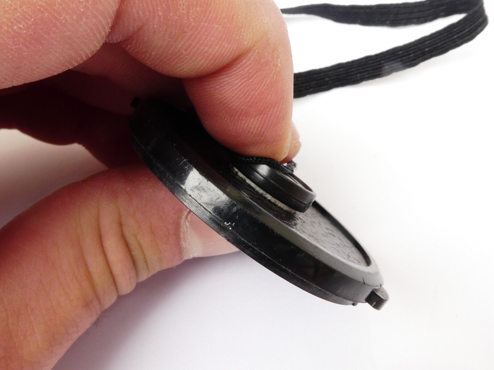 Used 49mm Lens Front Cap Black snap-on type plastic with strap Korea