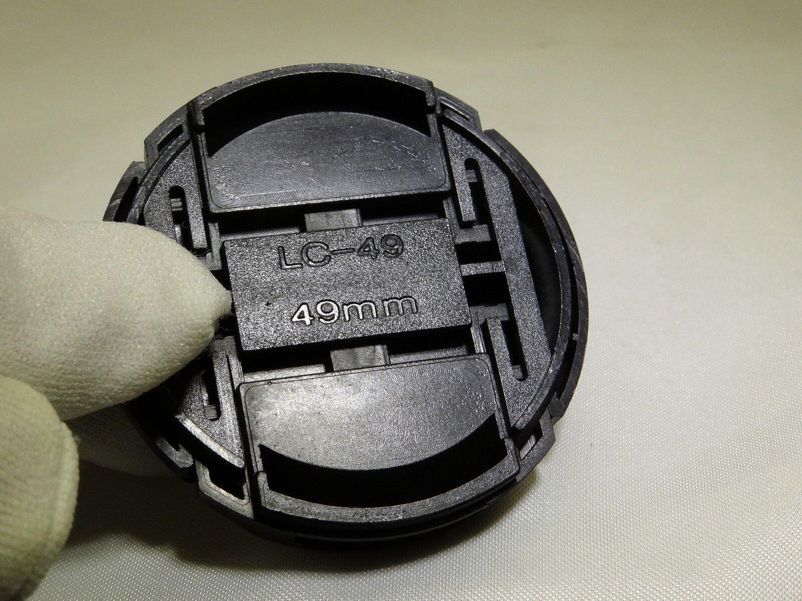 49mm Lens front cap snap on type plastic black