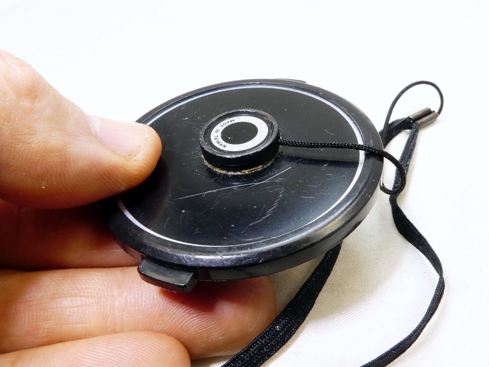 Black 55mm Lens front Cap  Snap on type with keeper string holder