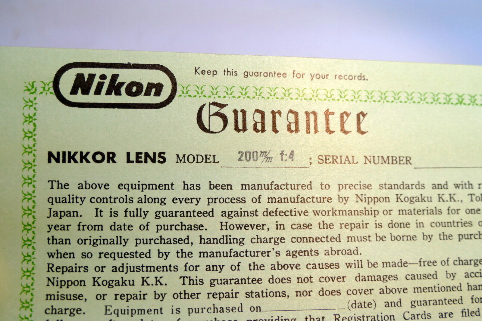 Nikon warranty card 1966 model 200mm f4 lens auto  Nikkor vintage