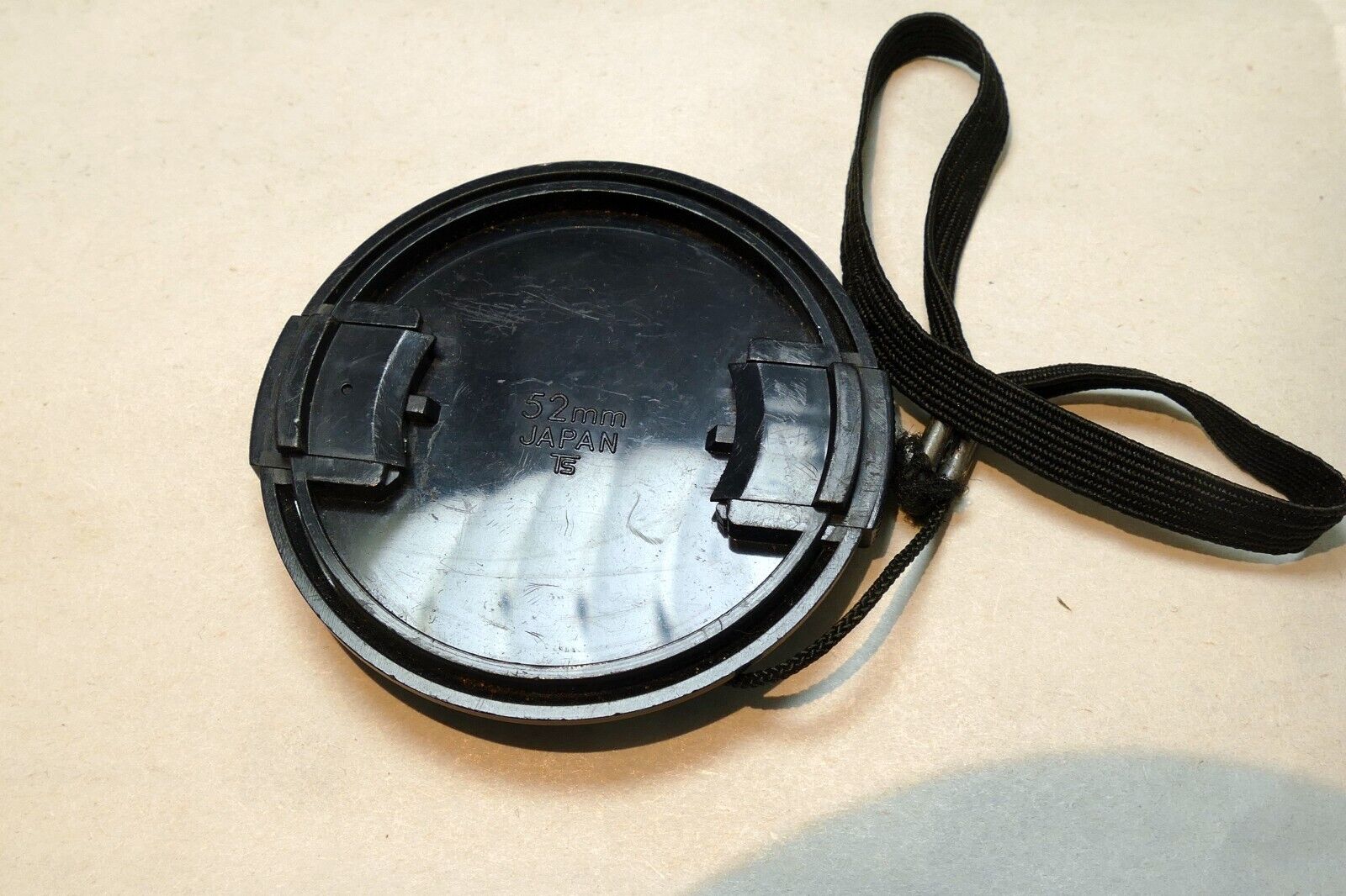 Toyo Optics 52mm lens front cap (snap on type) with keeper string