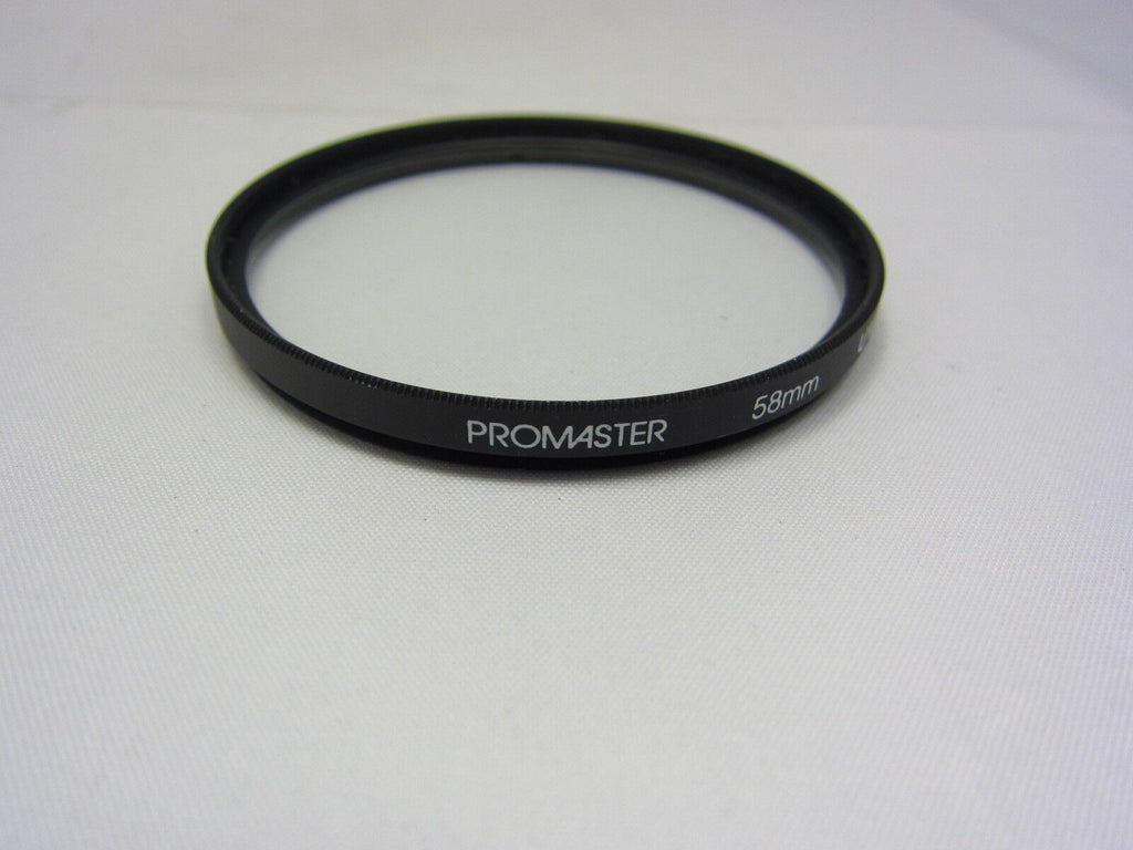 Used PROMASTER 58mm UV Lens Filter Glass Made in PHILIPPINES 6406009