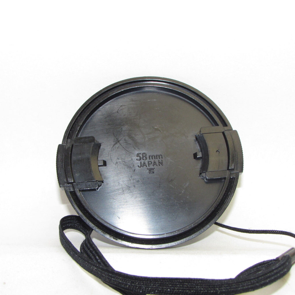 Used 58mm Lens front Cap Made in Japan with string attached S941227