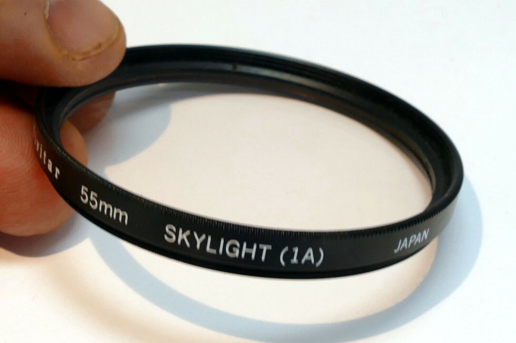 Vivitar  55mm Filter Skylight 1A sky  ( with coating scratched )