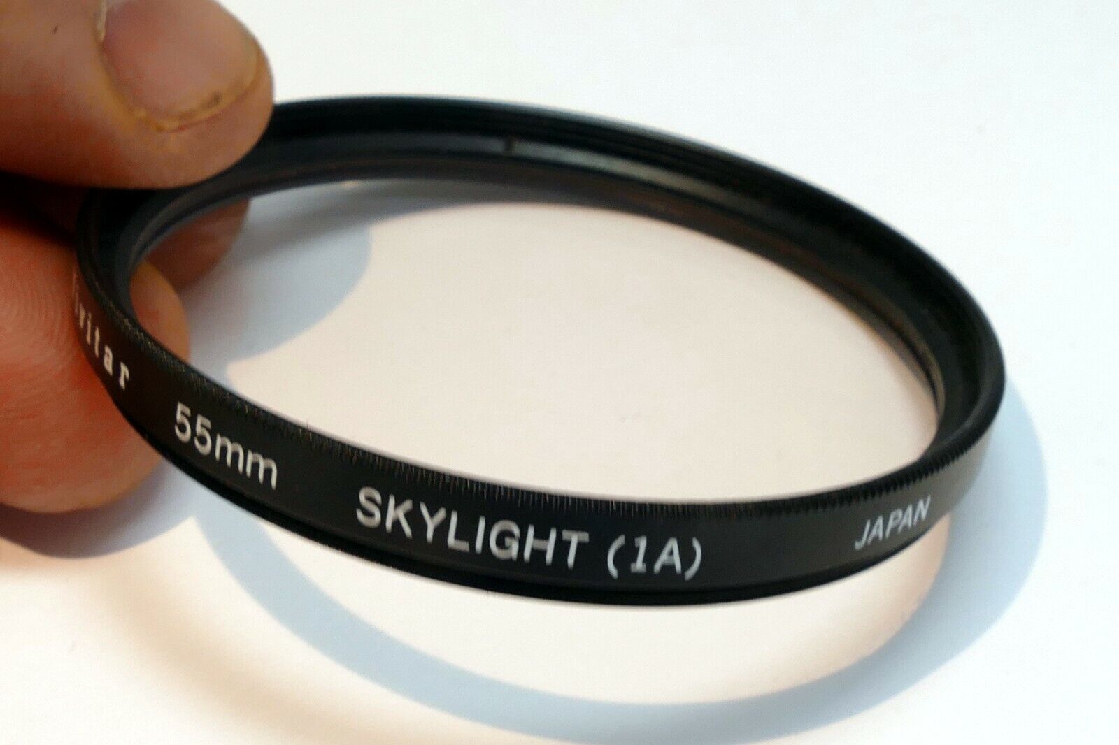 Vivitar  55mm Filter Skylight 1A sky  ( with coating scratched )