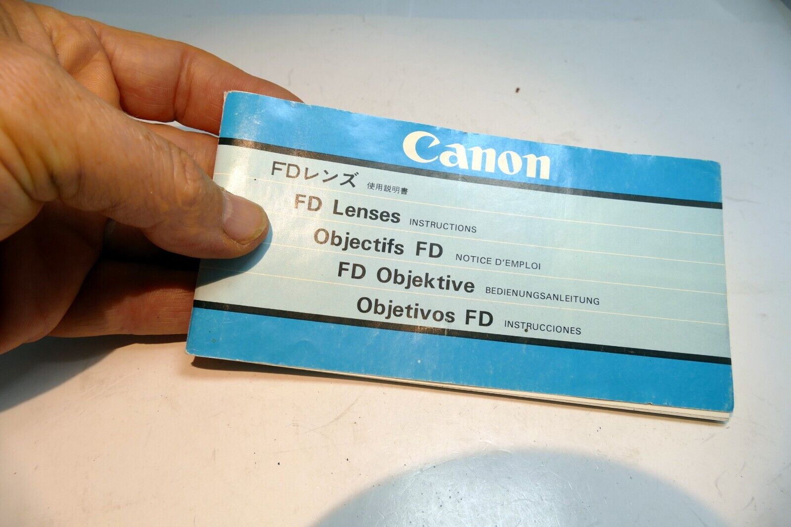 Canon FD lens table guide brochure (manual focus ) J E F G S