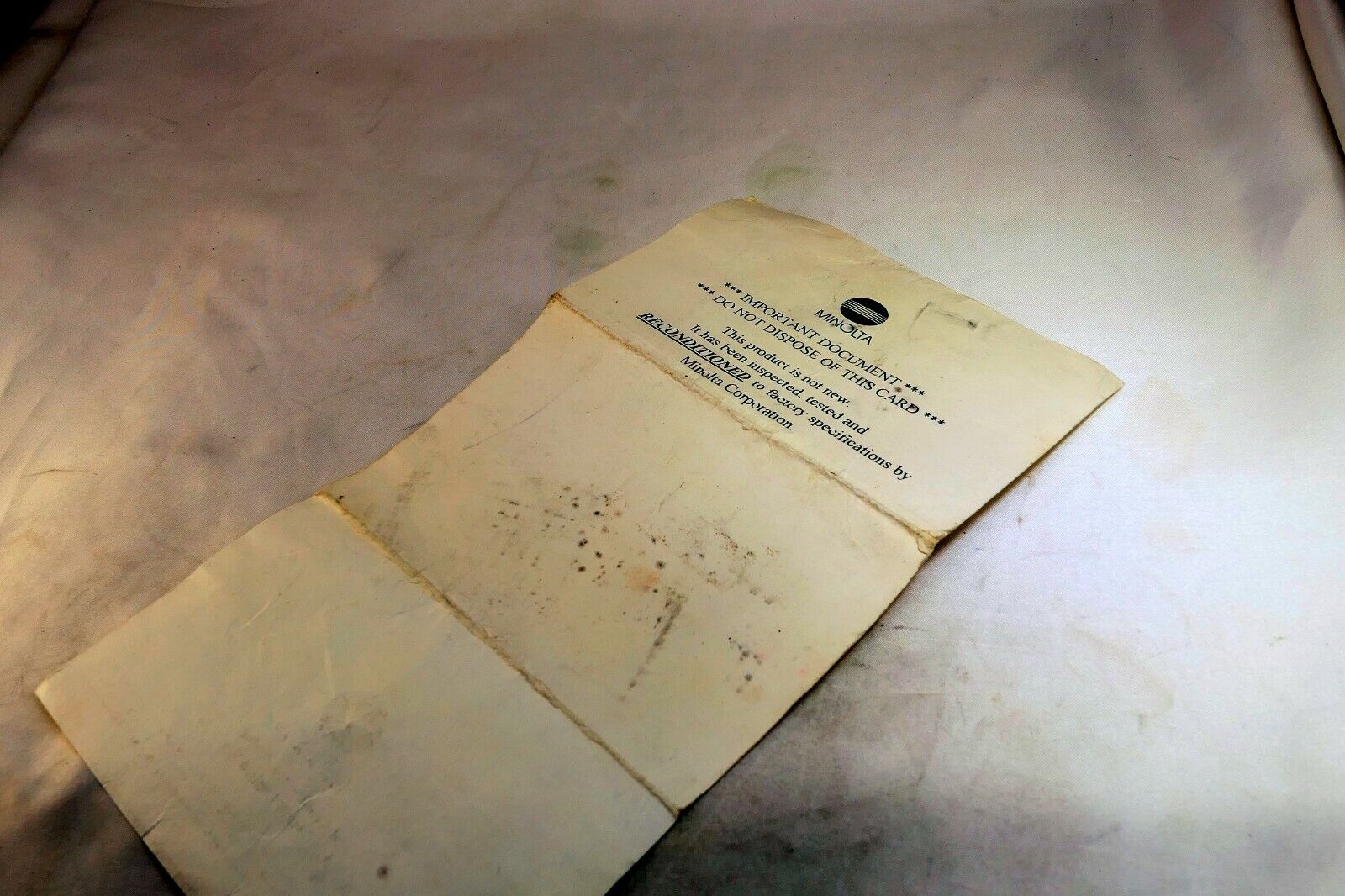 Minolta vintage warranty card (expired) for Reconditioned Maxxum STsi camera