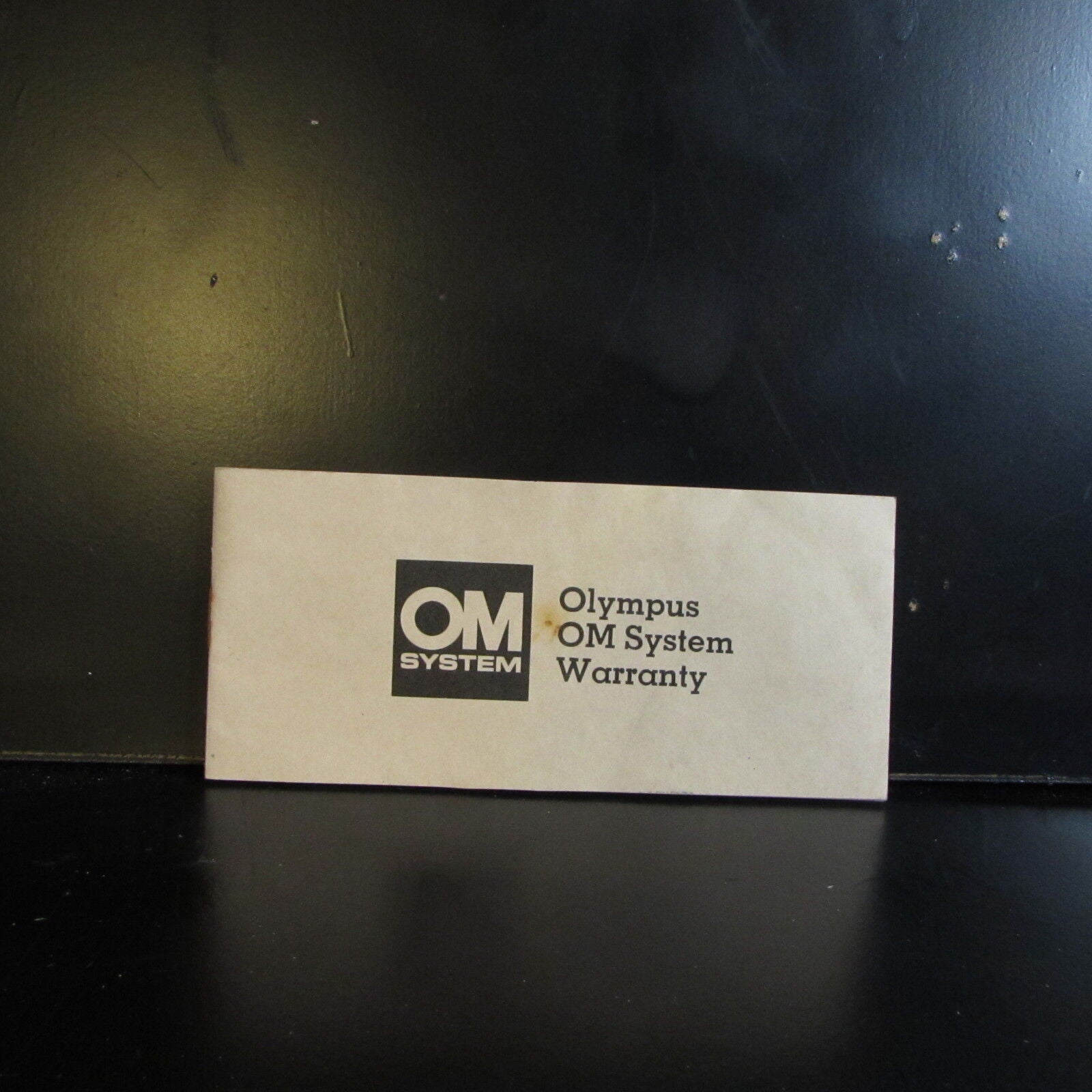 Vintage Olympus OM System Warranty card 1970-80's O401612