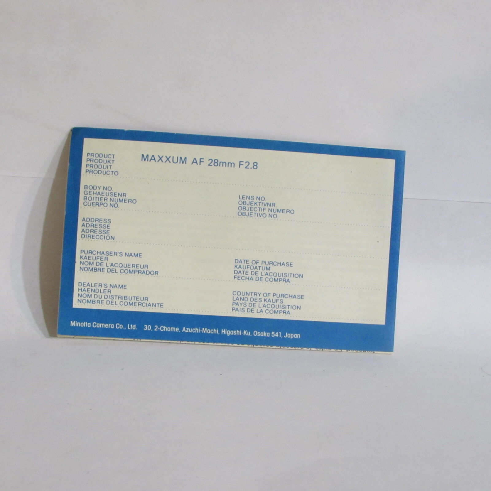 Minolta Maxxum 28mm f2.8 AF Lens International Warranty Certificate information
