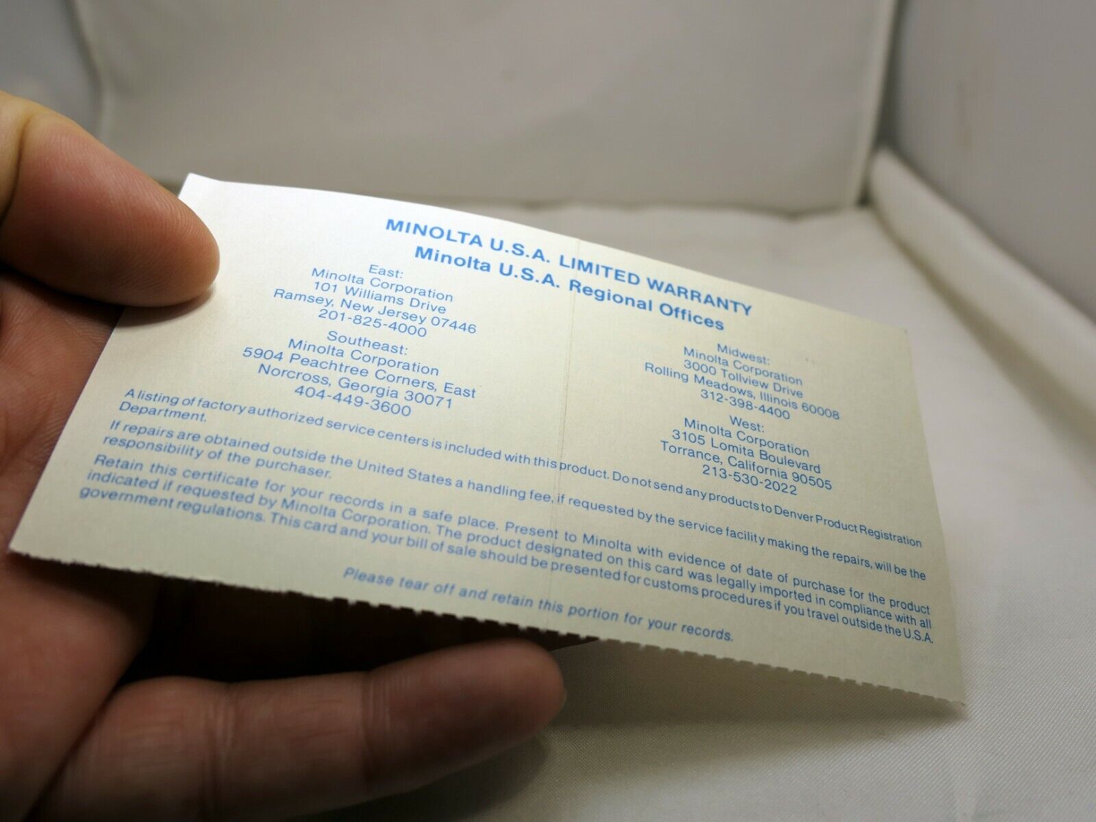 MINOLTA used  warranty card  for Maxxum  AF 70-210mm f4 lens