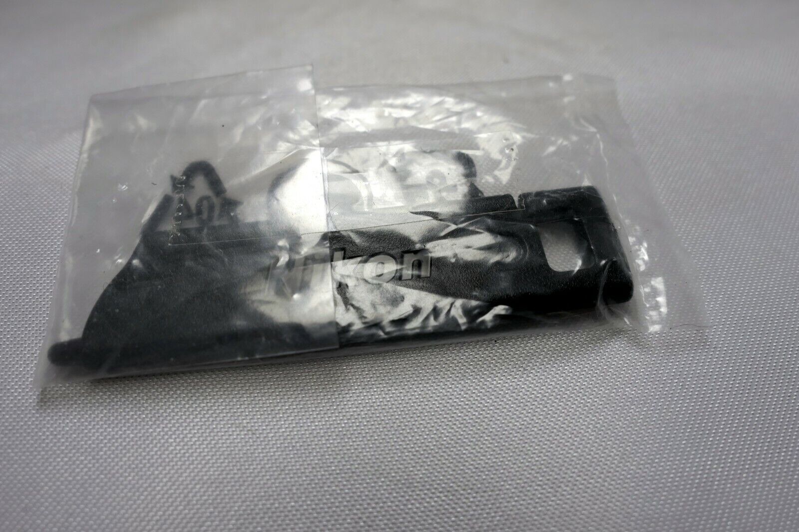 Nikon Coolpix camera plastic key pin