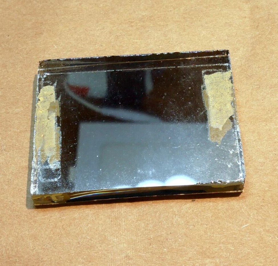 1.5X2" Diameter 0.25" thick First Surface 50% Semi-Transparent Mirror