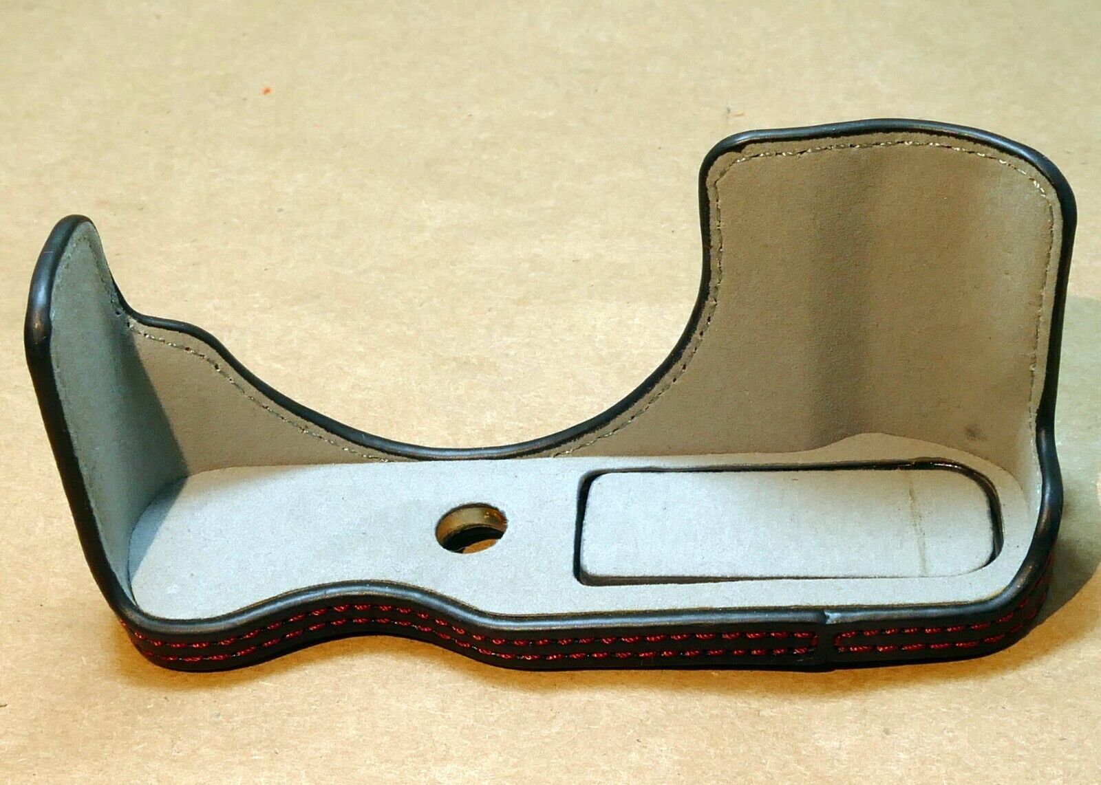 Black Half Case for Fujifilm X-T100 camera (missing tripod screw)