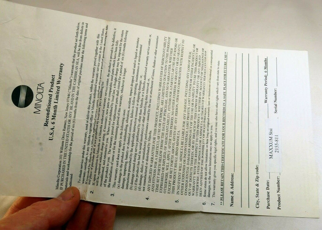Minolta vintage warranty card (expired) for Reconditioned Maxxum STsi camera