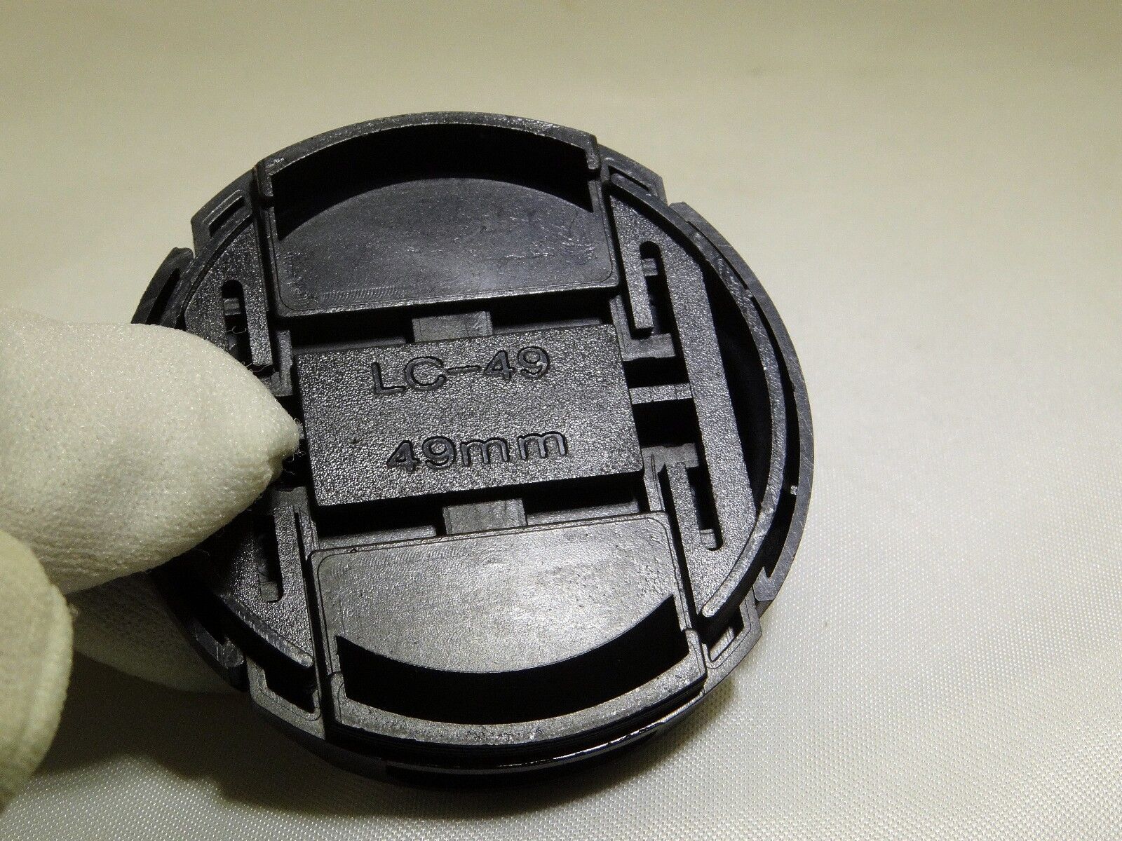 49mm Lens front cap snap on type plastic black