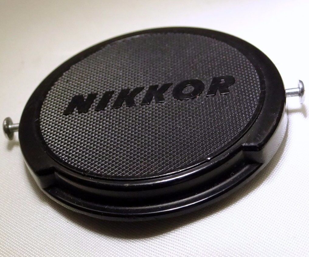 52mm Nikon Nikkor Front Nikon Cap snap on JUM 515,397  OEM