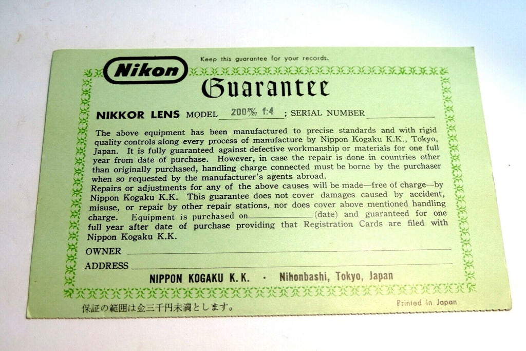 Nikon warranty card 1966 model 200mm f4 lens auto  Nikkor vintage