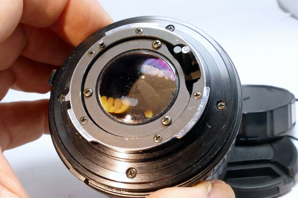 Minolta 50mm f1.7 MD manual focus with couple spots of fungus webbing works good