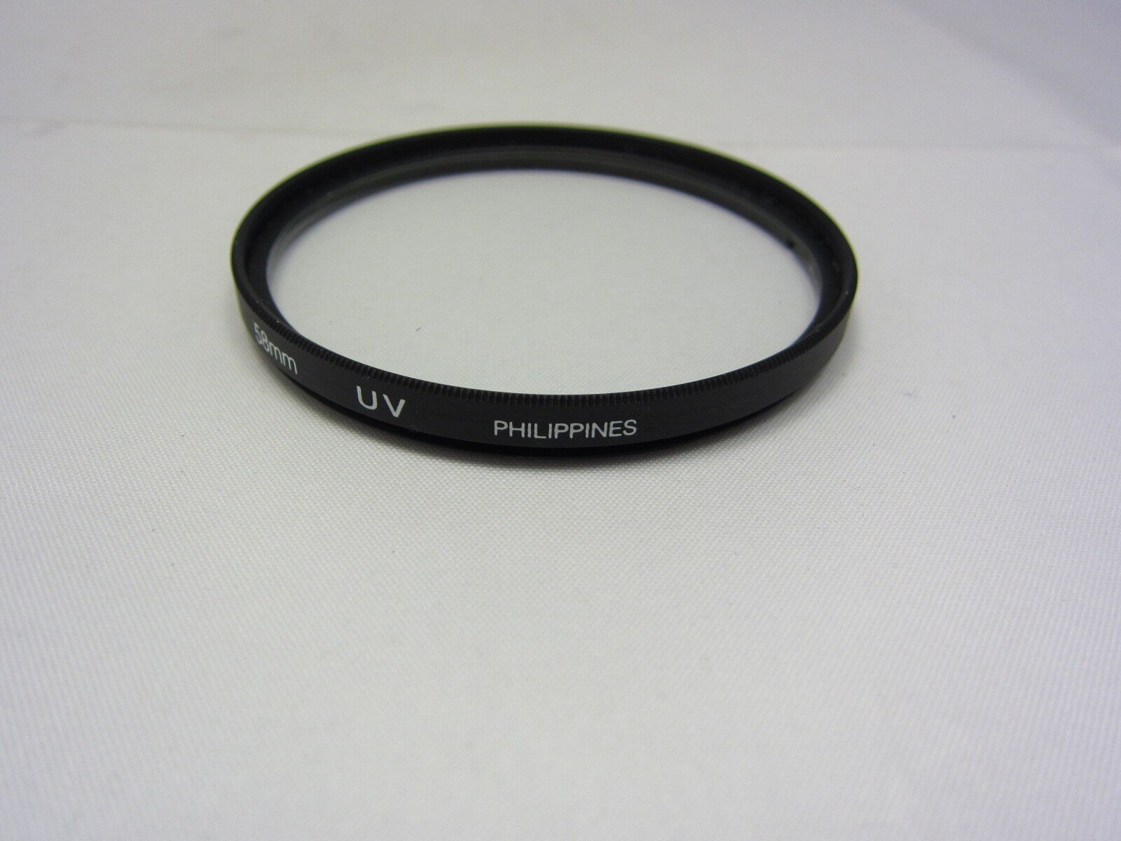 Used PROMASTER 58mm UV Lens Filter Glass Made in PHILIPPINES 6406009