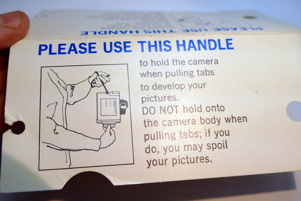 Polaroid  card guide how to remove film