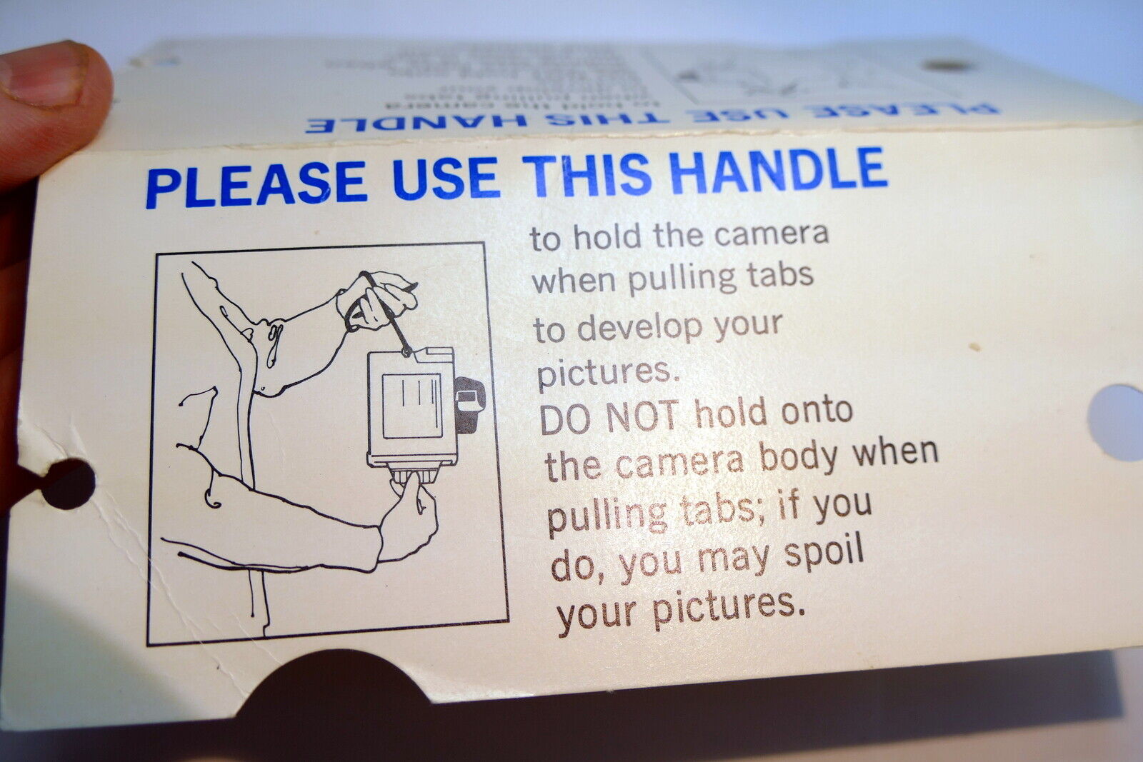 Polaroid  card guide how to remove film