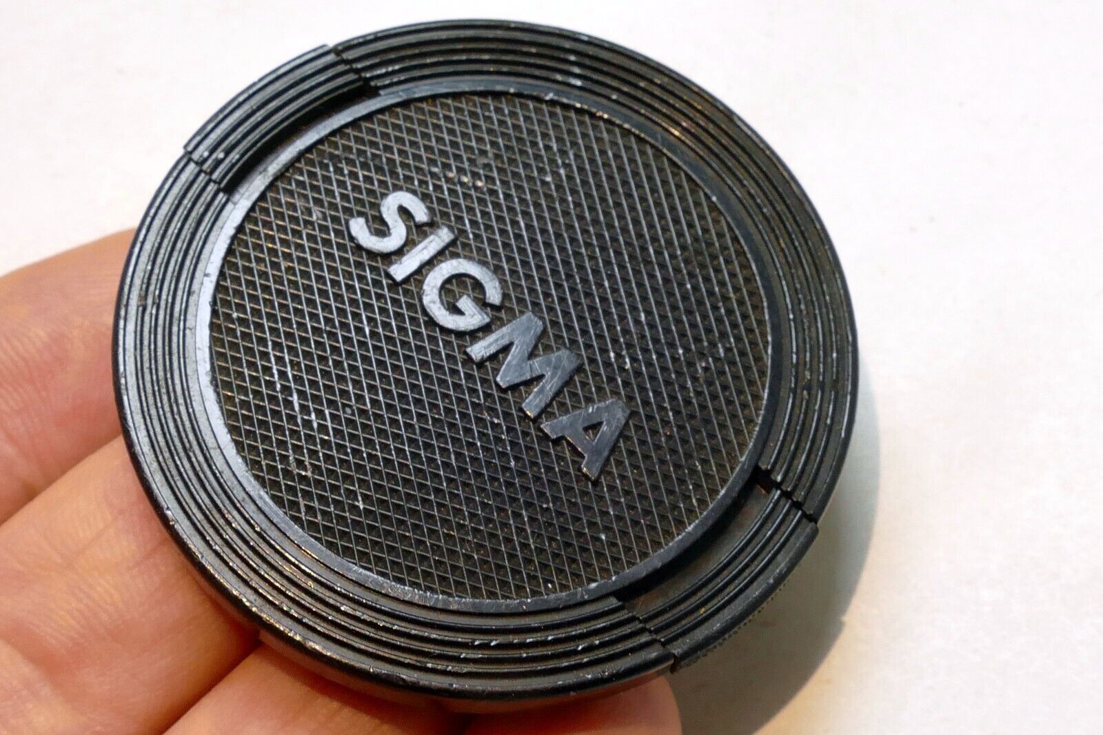 Sigma 52mm lens front cap (snap on type) for 28mm mini-wide