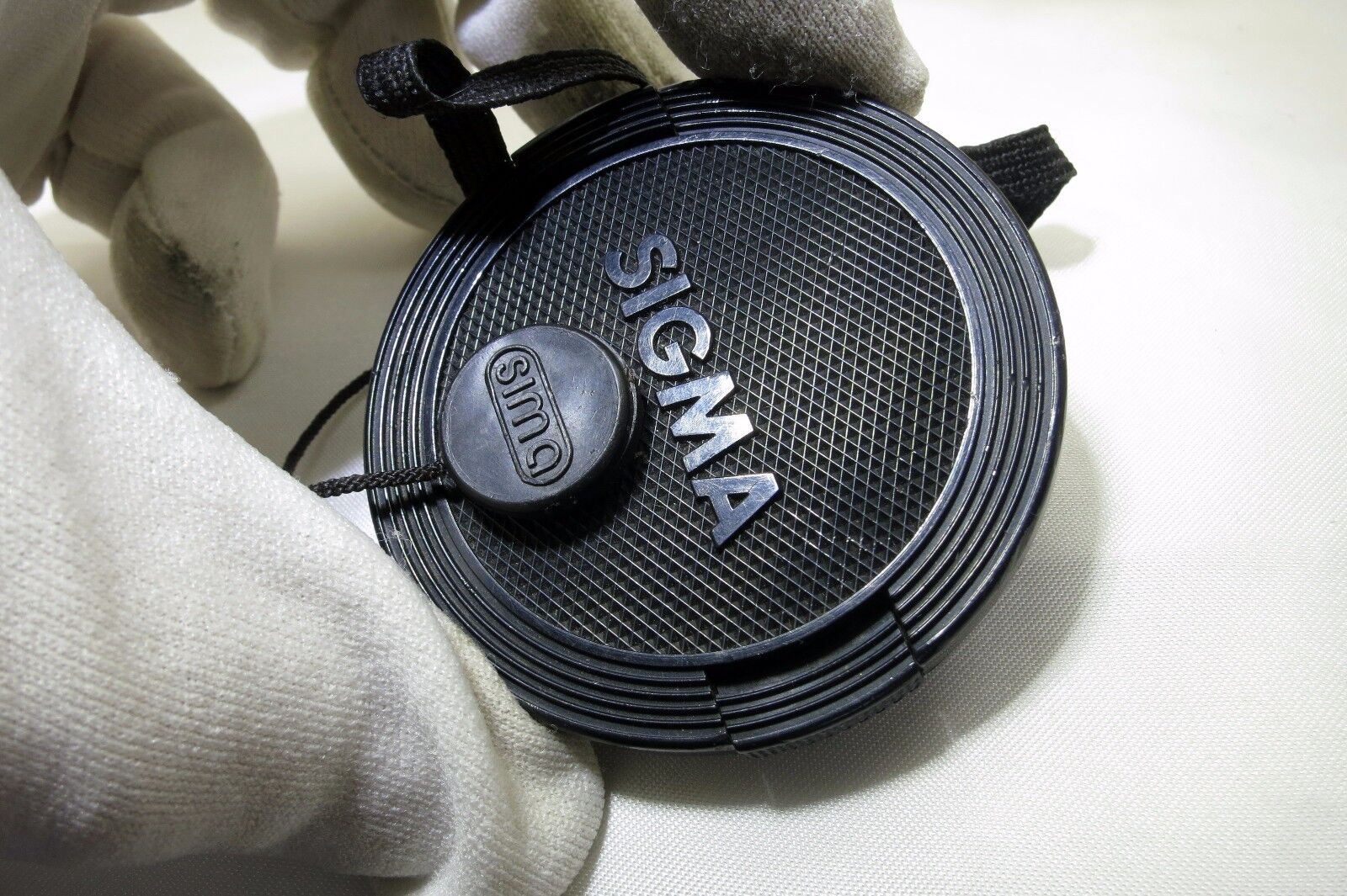 Sigma 55mm Front Cap dust cover with keeper string