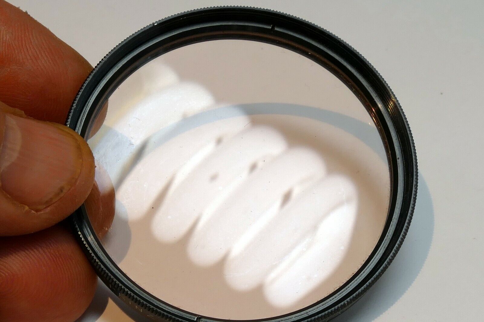 Prinz  55mm Filter Skylight 1A sky   ( with coating scratched )