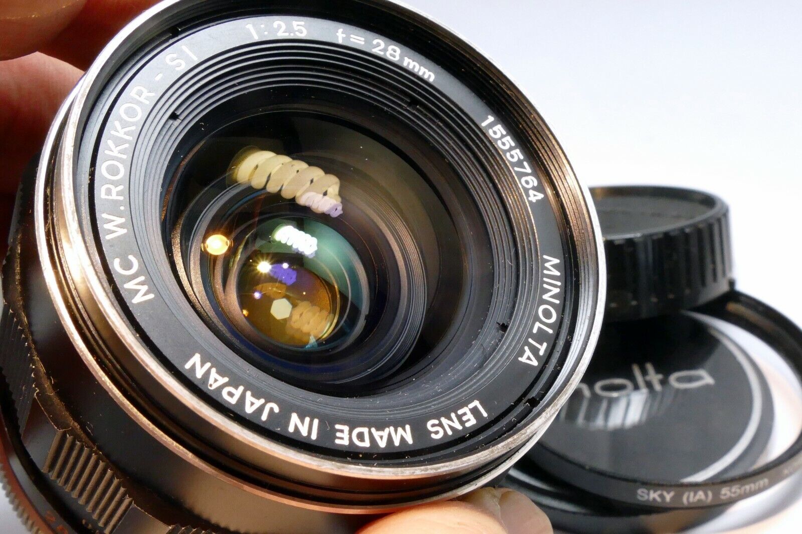 Minolta 28mm f2.5 Lens manual Focus MC W Rokkor- SI ( slow aperture, and dust )