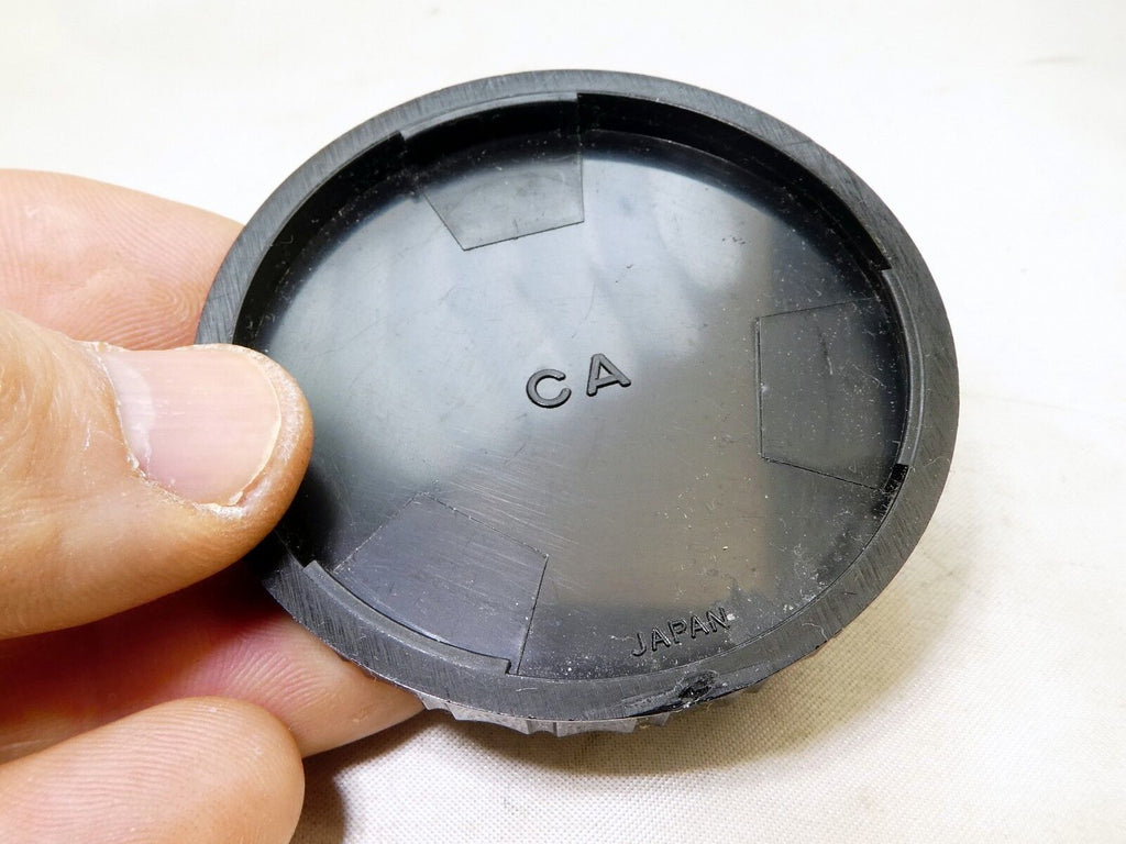 CA rear lens cap twist on type