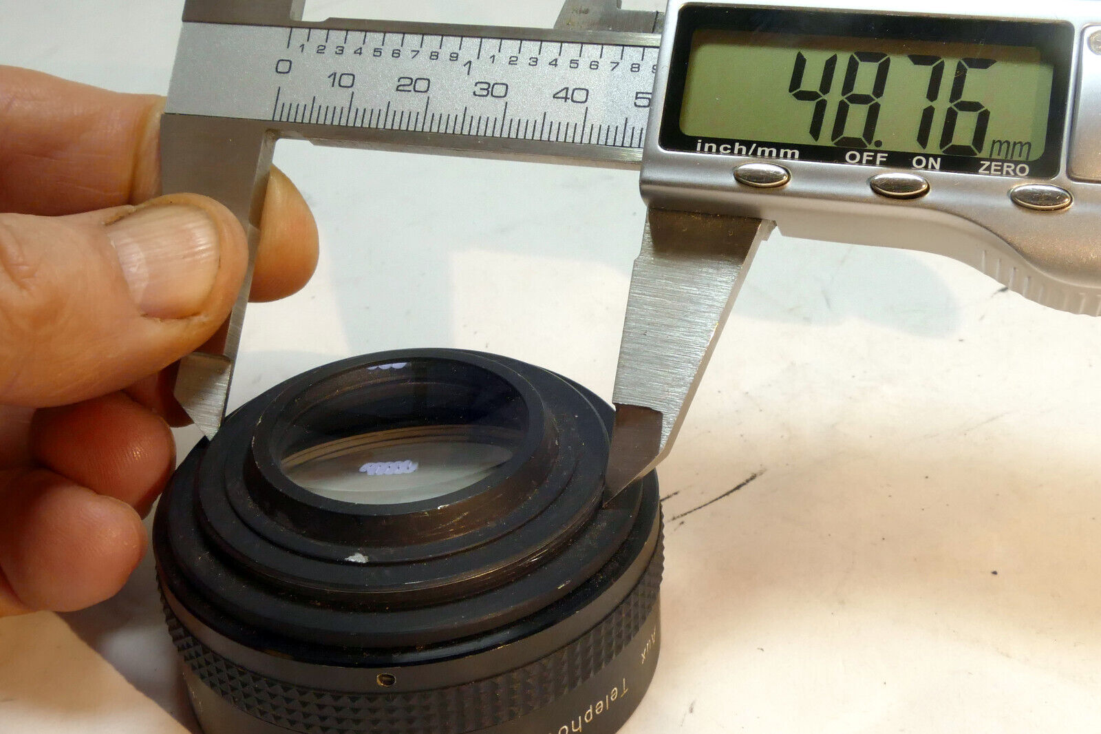 Hanimex AUX Telephoto 49mm Lens for Praktica (with some haze)