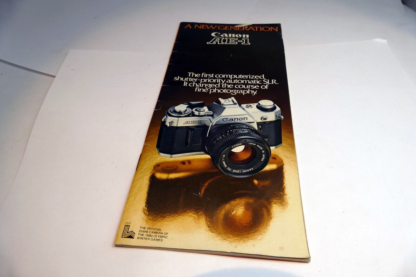 "Canon AE-1 NEW GENERATION" camera Brochure Accessory Chart Guide English E