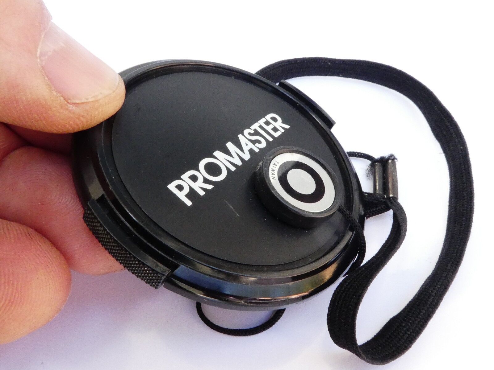 Promaster 52mm Front  Lens cap plastic snap on type 2 Japan with strap