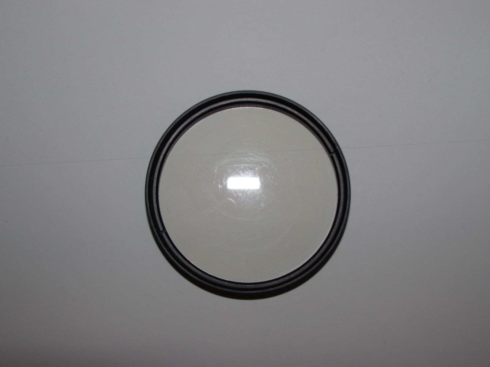 genuine Tokina UV 62mm Lens Filter Made in Japan coating scratched by cleaning