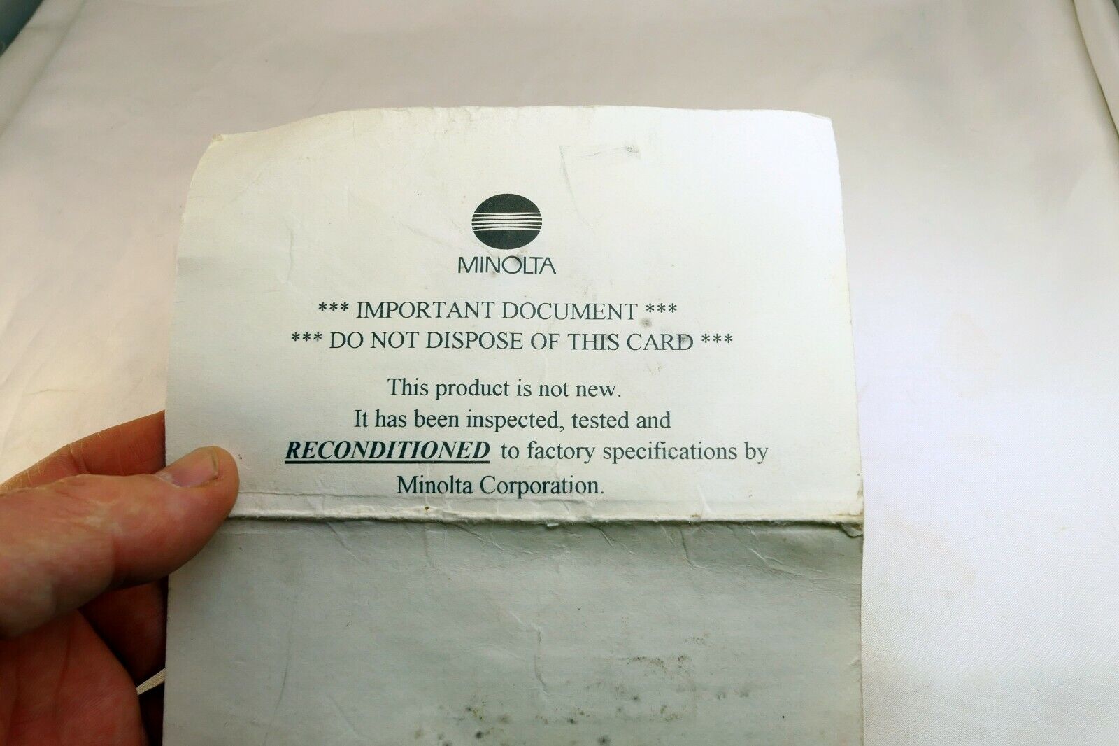 Minolta vintage warranty card (expired) for Reconditioned Maxxum STsi camera