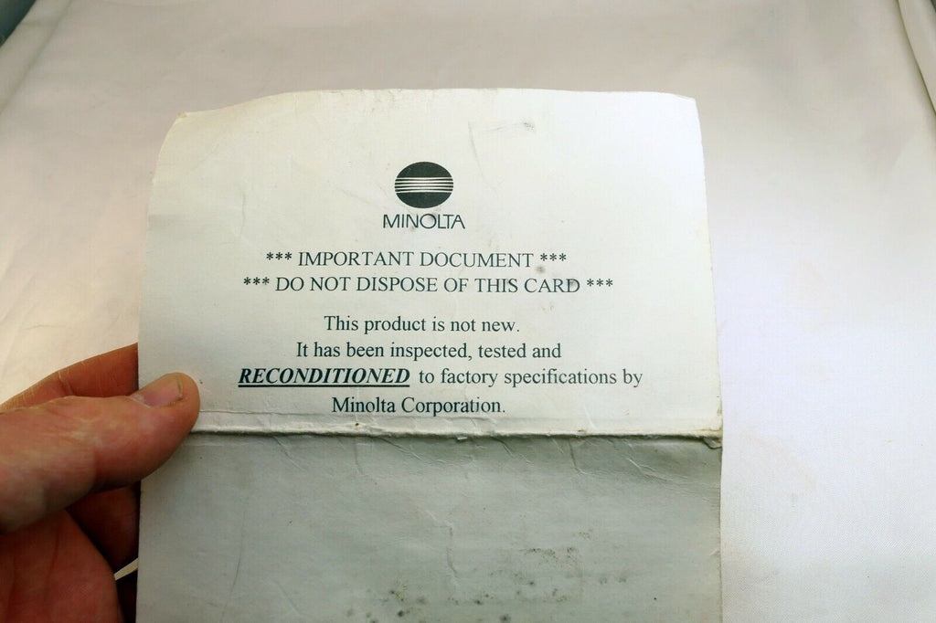 Minolta vintage warranty card (expired) for Reconditioned Maxxum STsi camera