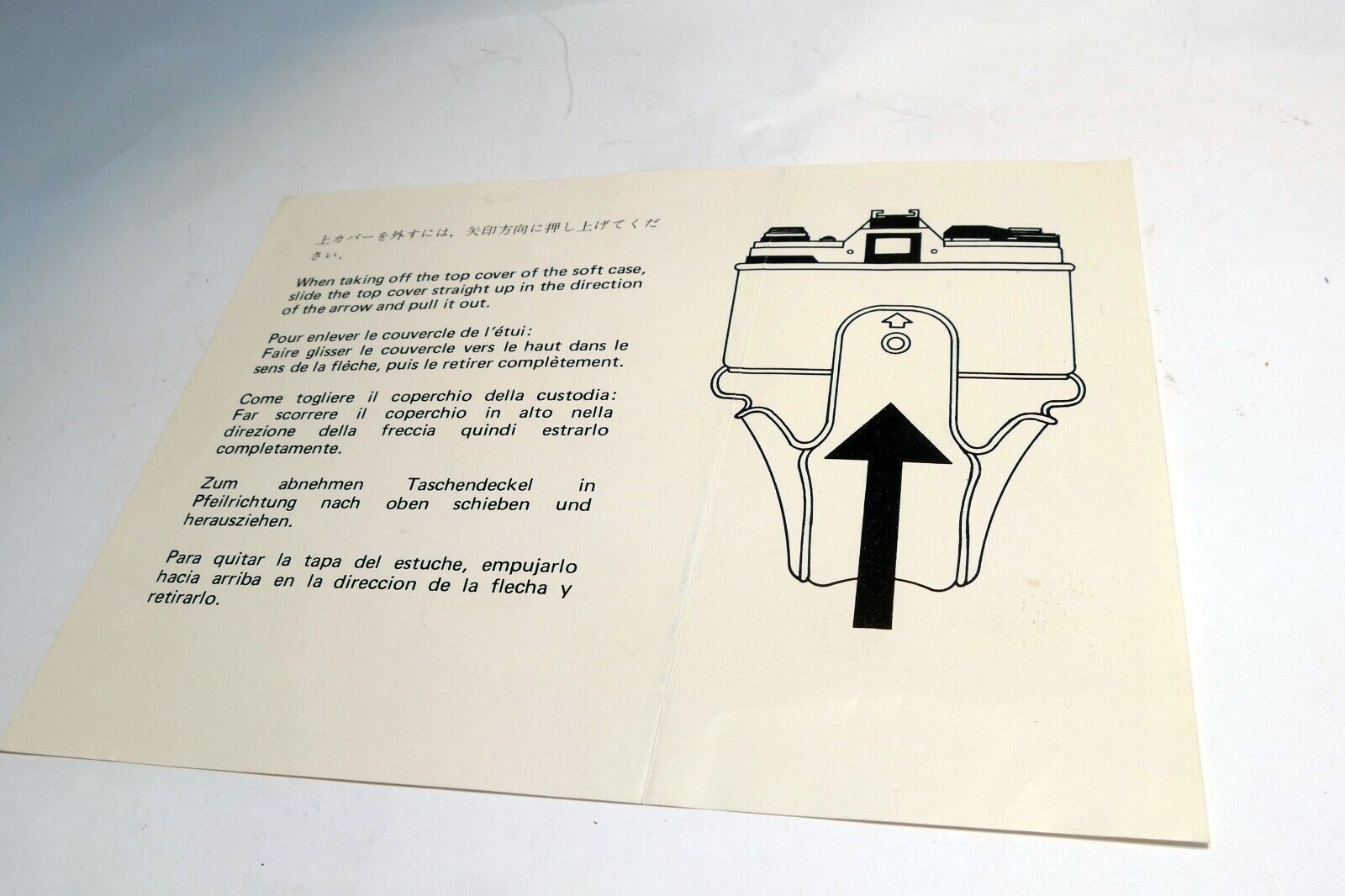 Instructions for Case removal for Canon AE-1 camera brochure vintage 1976