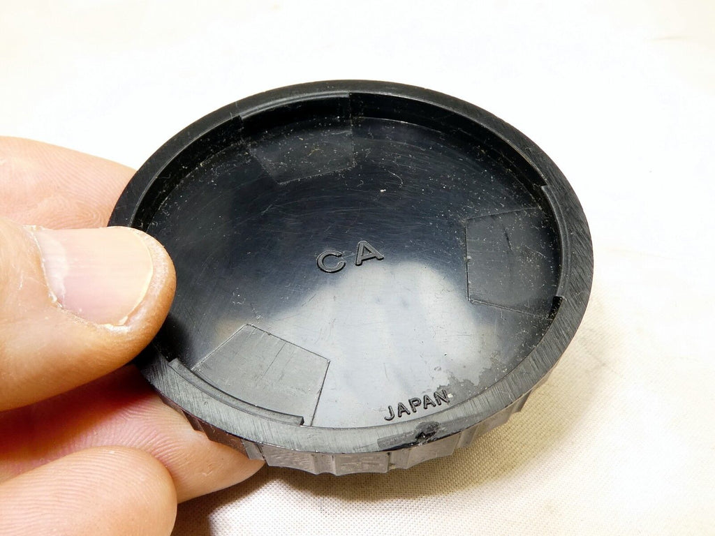 CA rear lens cap twist on type