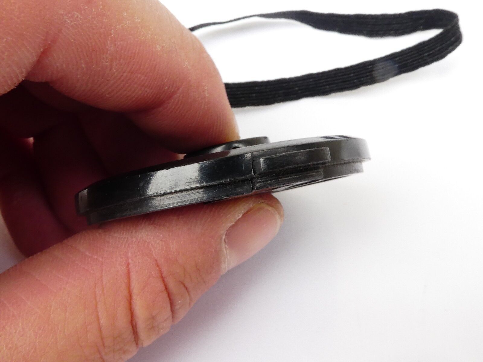 Used 49mm Lens Front Cap Black snap-on type plastic with strap Korea